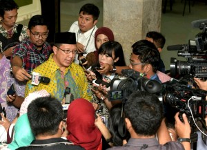 Menteri Agama menjawab pertanyaan wartawan usai mendampingi Presiden Jokowi Temui Pengurus MUI Pusat di Istana Merdeka, Jakarta (5/1)