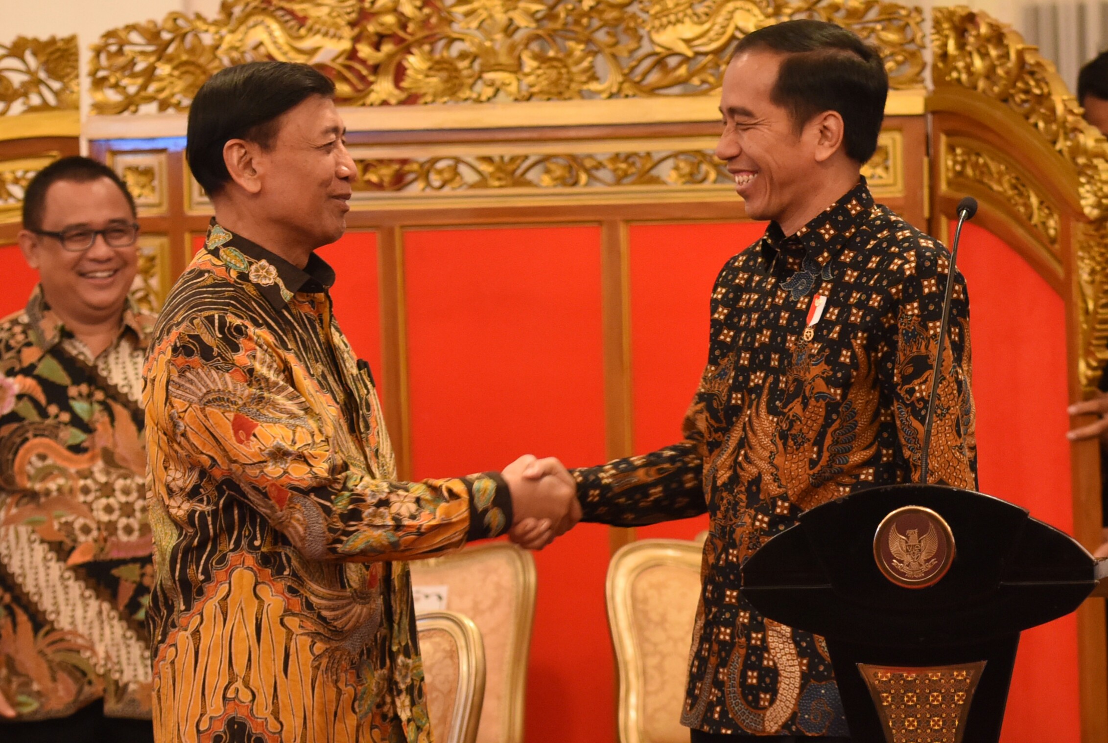 President Jokowi says happy birthday to Coordinating Minister for Political, Legal, and Security Affairs Wiranto before leading a plenary cabinet meeting at the State Palace, Jakarta (4/4). (Photo by: Public Relations Division/Rahmat)