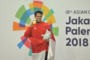 Komang Harik Adi Putra won gold at final round in a pencak silat competition held at Padepokan Pencak Silat, Taman Mini Indonesia Indah (TMII), Jakarta, Monday (27/8). (Foto: PR/Jay).